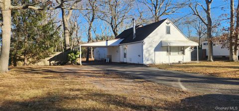 Photo of 299 Whittier Drive, Mastic Beach, NY 11951 (MLS # 943897)