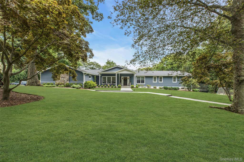 Photo of 7 Ridge Drive, Melville, NY 11747 (MLS # 1039630)