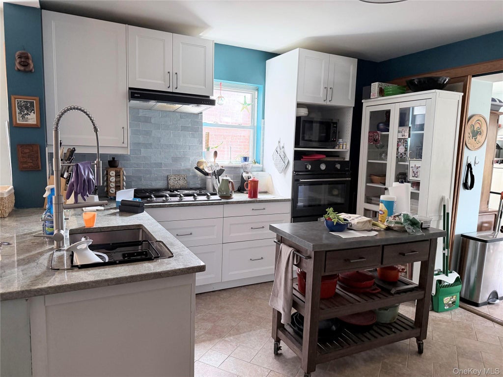 Photo of 6362 84th Place, Middle Village, NY 11379 (MLS # 1059515)