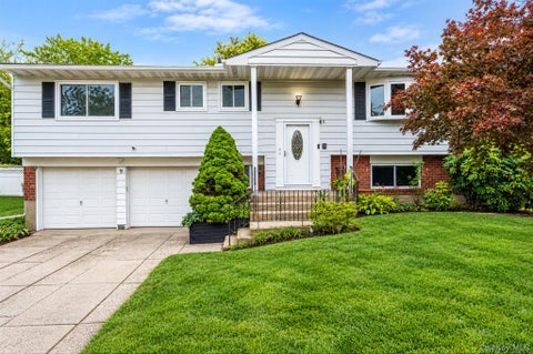 Photo of 9 Thorman Lane, North Babylon, NY 11703 (MLS # 1065387)