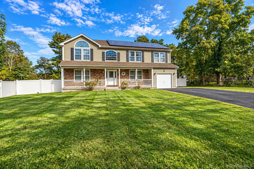 Photo of 13 Glenmore Avenue, Brentwood, NY 11717 (MLS # 1063566)