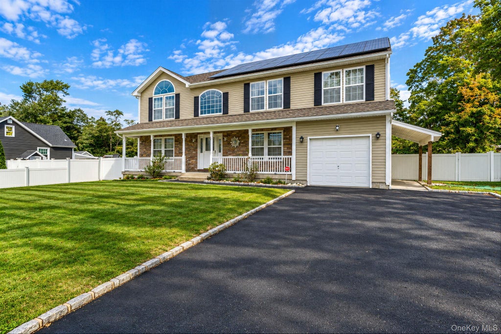 Photo of 13 Glenmore Avenue, Brentwood, NY 11717 (MLS # 1063566)