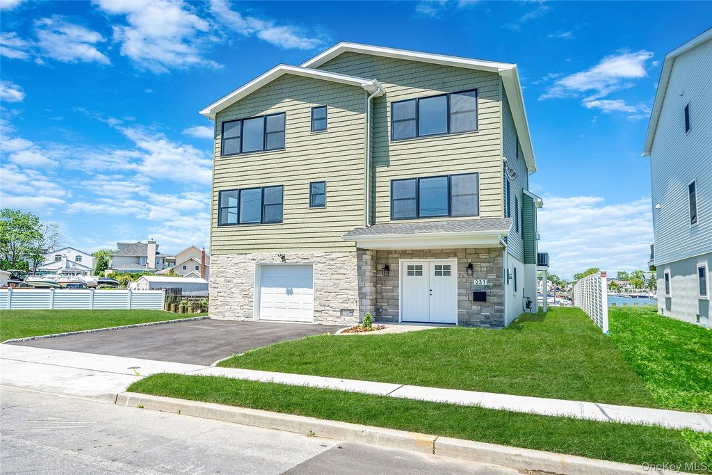 Photo of 237 Mott Street, Oceanside, NY 11572 (MLS # 985593)