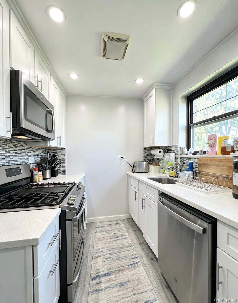 Photo of 67-67 136TH STREET St #A, Flushing, NY 11367 (MLS # 1034975)