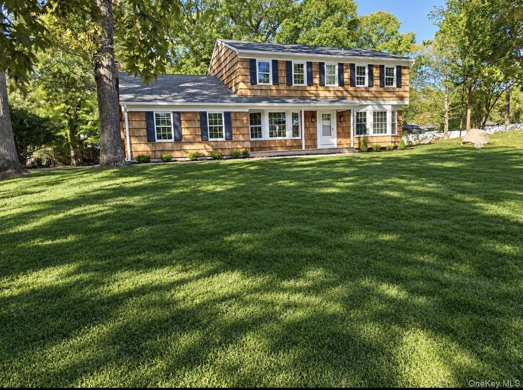 Photo of 7 Woodland Road, Miller Place, NY 11764 (MLS # 1061464)