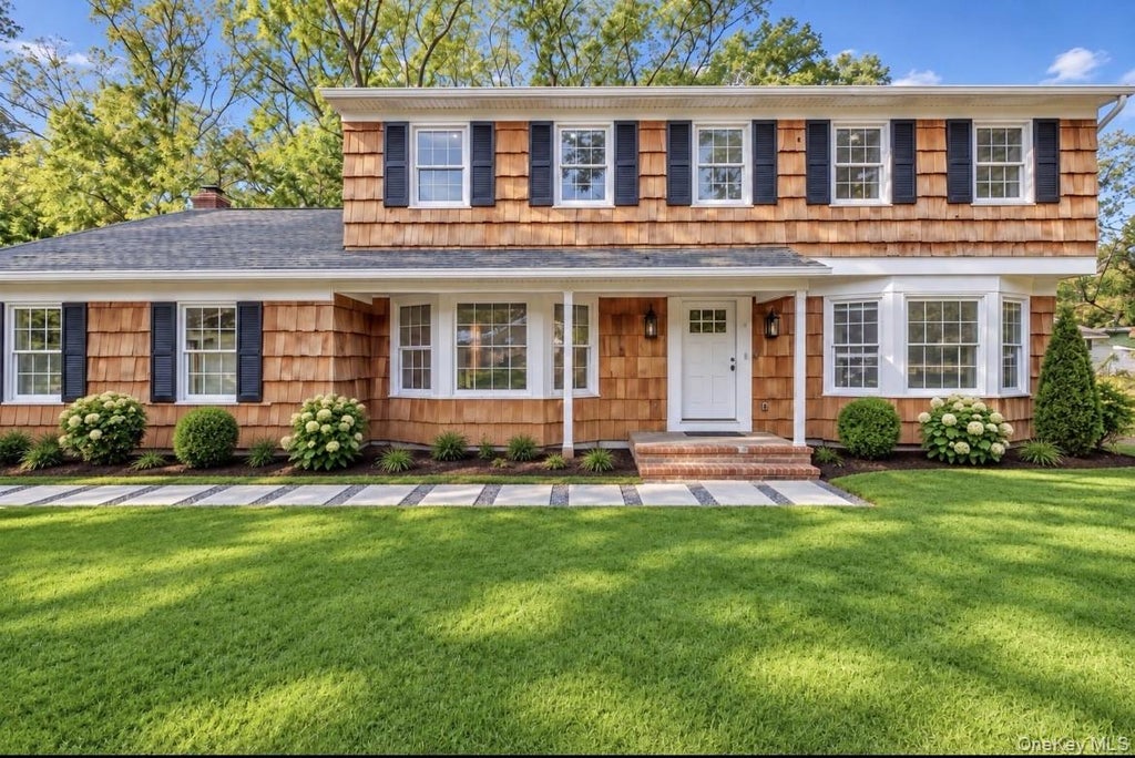 Photo of 7 Woodland Road, Miller Place, NY 11764 (MLS # 1061464)