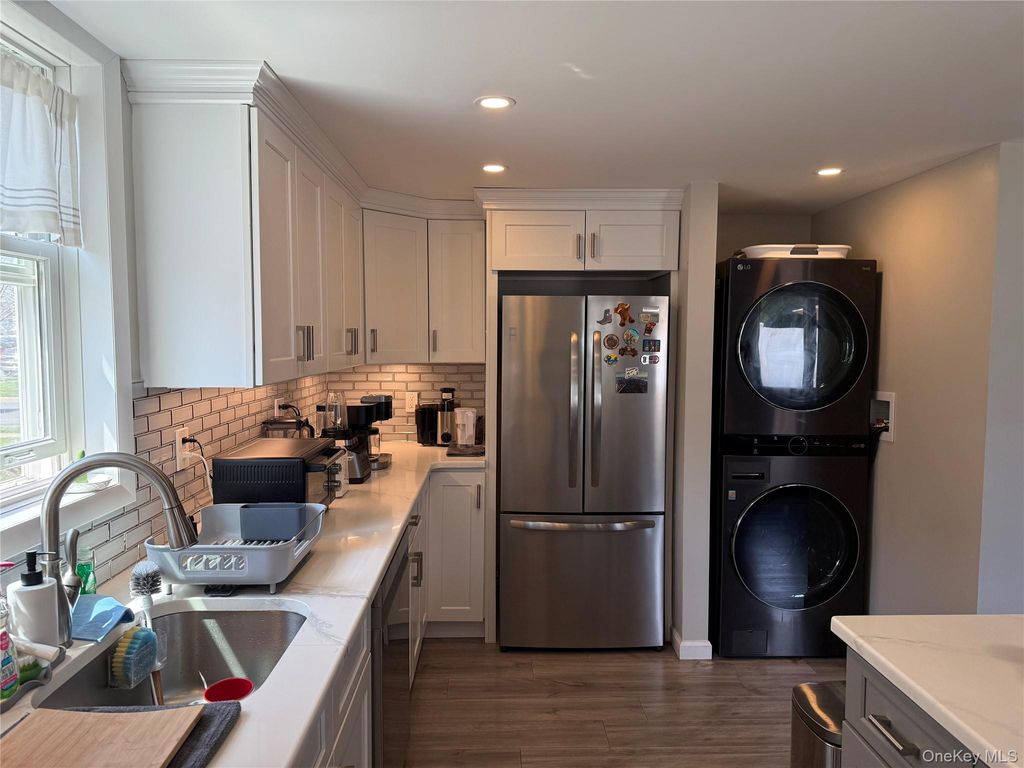 Photo of 12 Carlton Drive, Massapequa, NY 11758 (MLS # 986516)