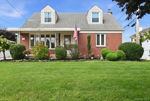 Photo of 303 Caroline Avenue, Garden City South, NY 11530 (MLS # 1045629)