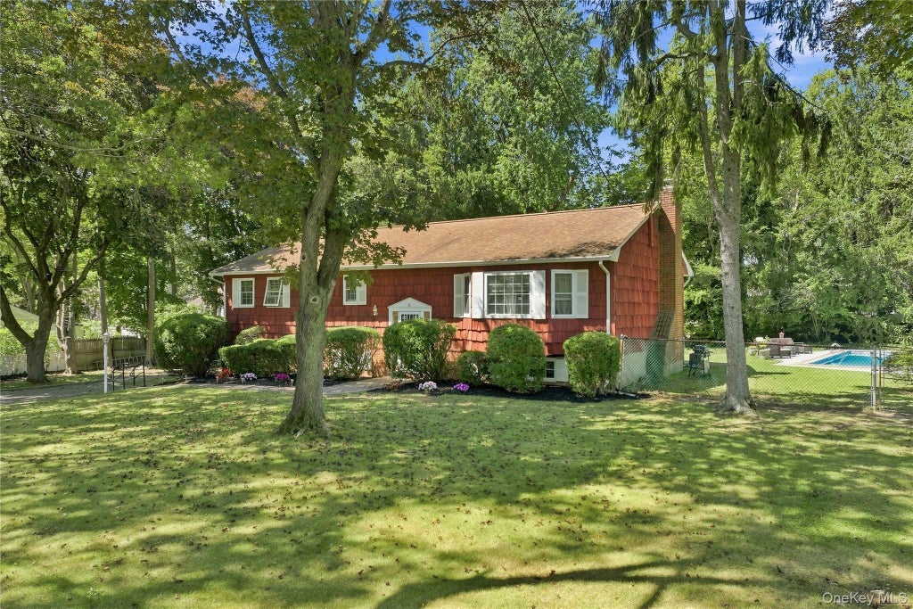 Photo of 77 Whitson Road, Huntington Station, NY 11746 (MLS # 1065718)