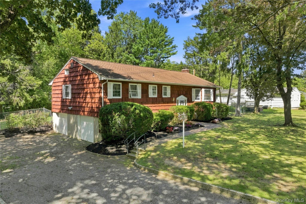 Photo of 77 Whitson Road, Huntington Station, NY 11746 (MLS # 1065718)