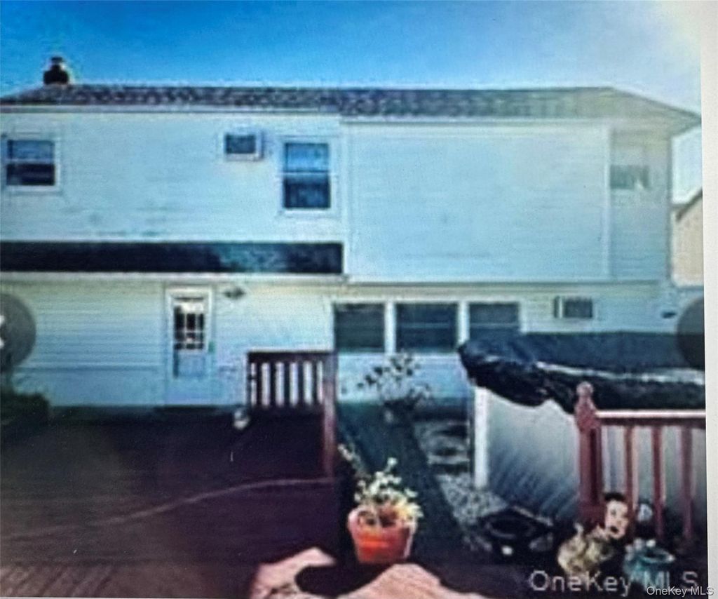 Photo of 68 Howard Avenue, Freeport, NY 11520 (MLS # 977810)