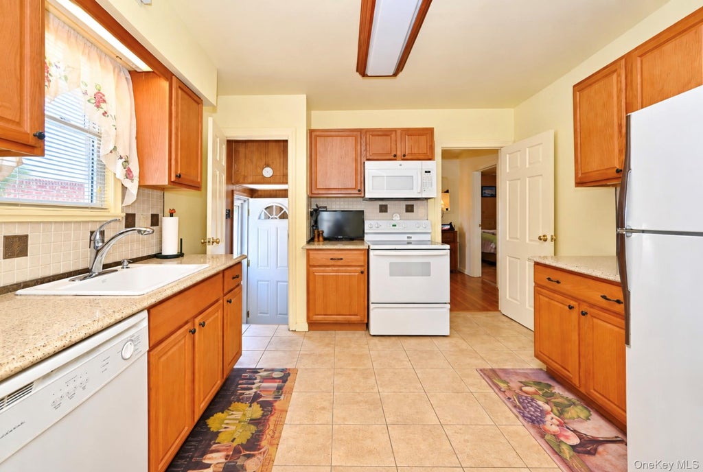 Photo of 173-32 47th Avenue, Flushing, NY 11358 (MLS # 1065323)