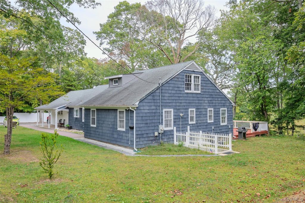 Photo of 477 Gibbs Pond Road, Nesconset, NY 11767 (MLS # 922137)