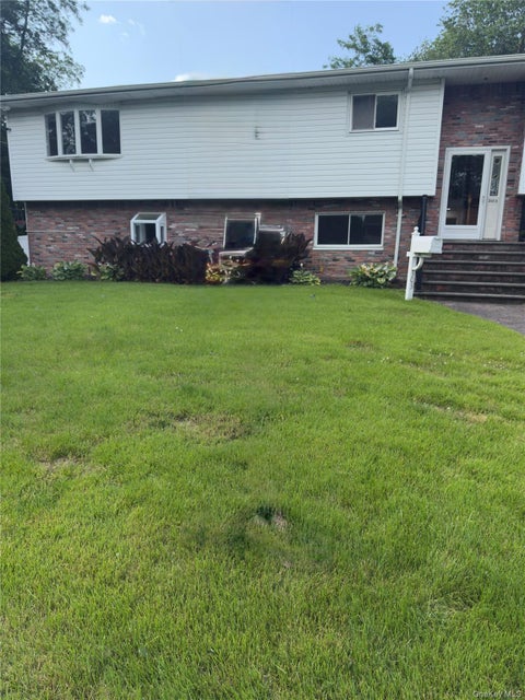 Photo of 303 Alfred Street, North Babylon, NY 11703 (MLS # 1064998)