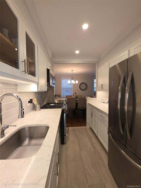 Photo of 1 Oakridge Place #5K, Eastchester, NY 10709 (MLS # 1006713)