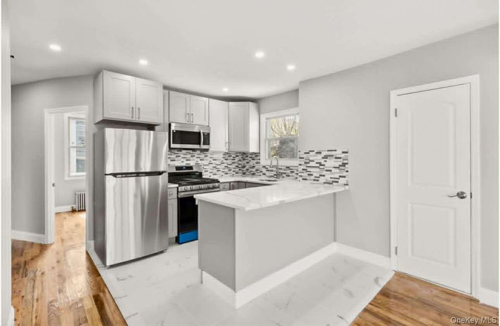 Photo of 1028 E 84th Street, Brooklyn, NY 11236 (MLS # 988411)