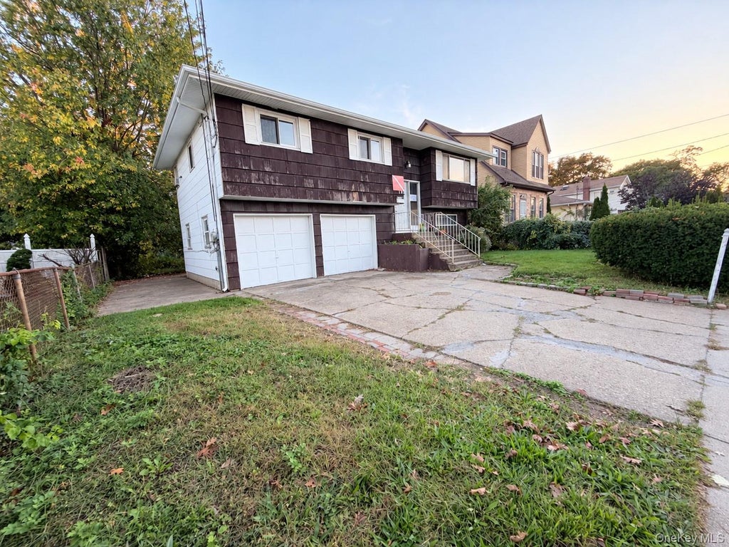 Photo of 105 Debevoise Avenue, Roosevelt, NY 11575 (MLS # 1063323)