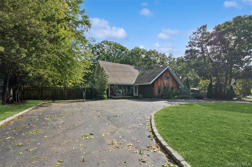 Photo of 65 Morris Avenue, Holtsville, NY 11742 (MLS # 1057289)