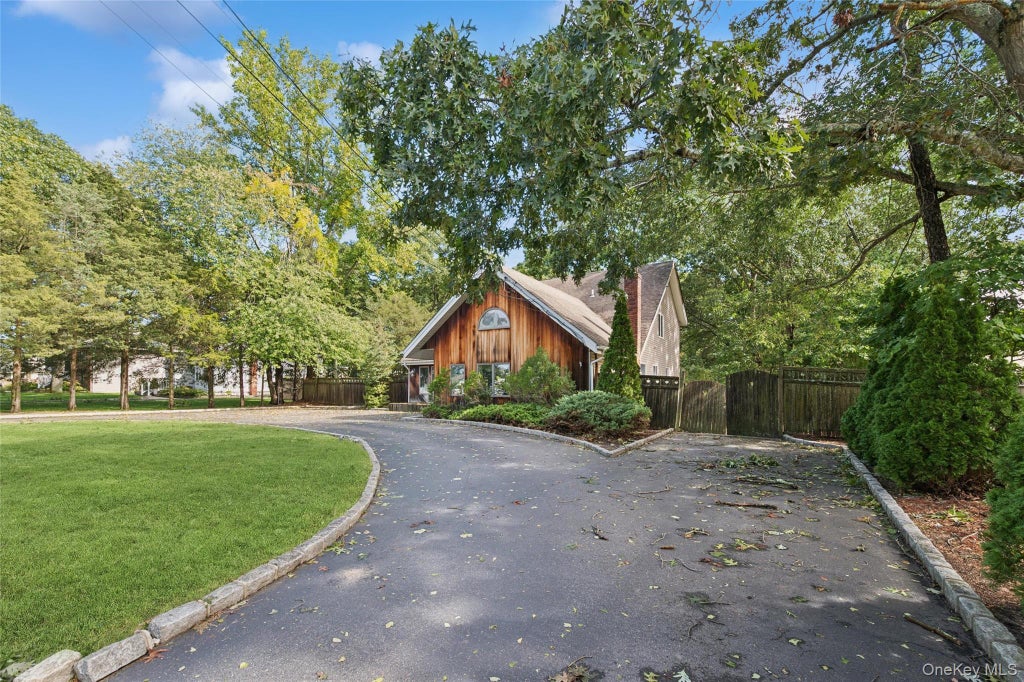 Photo of 65 Morris Avenue, Holtsville, NY 11742 (MLS # 1057289)