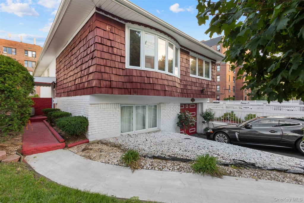 Photo of 552 Briar Place, Far Rockaway, NY 11691 (MLS # 1046867)