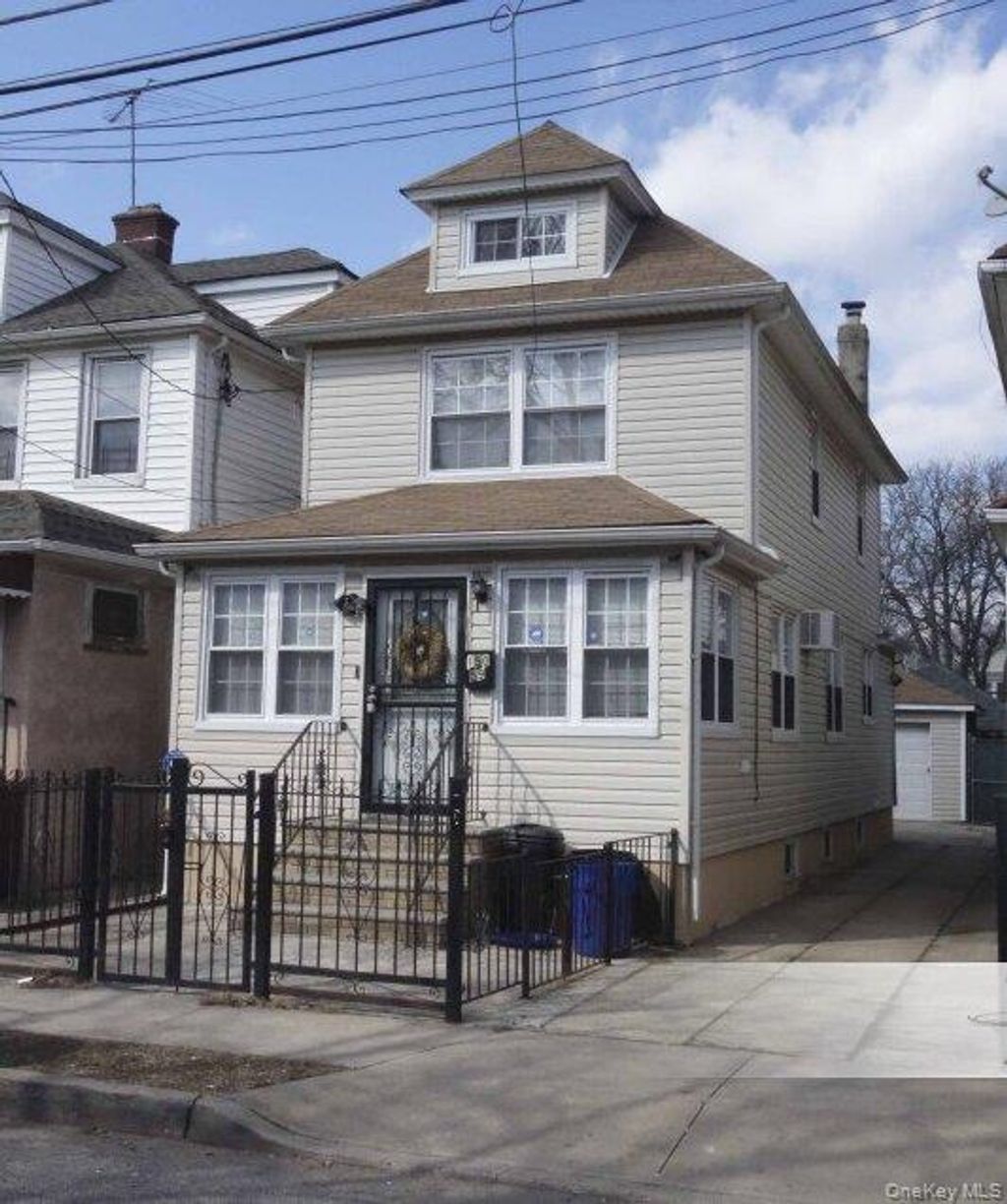 Photo of 15059 115th Drive, Jamaica, NY 11434 (MLS # 967479)