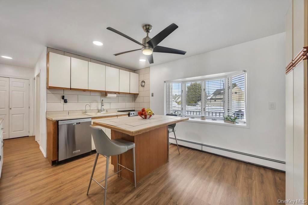 Photo of 119 Scooter Lane, Hicksville, NY 11801 (MLS # 960526)