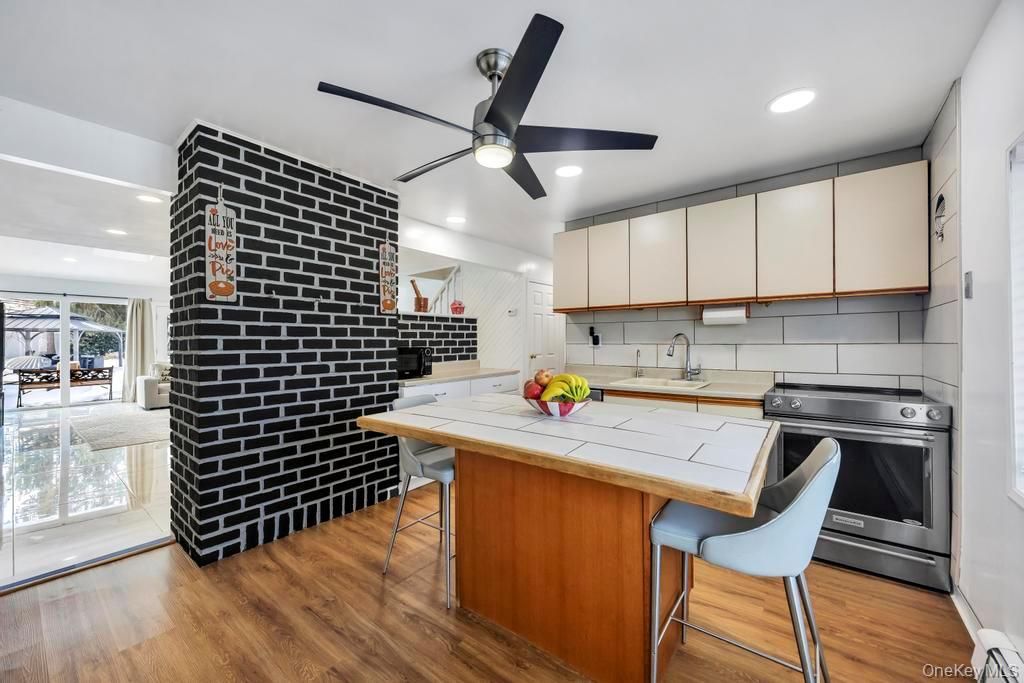 Photo of 119 Scooter Lane, Hicksville, NY 11801 (MLS # 960526)