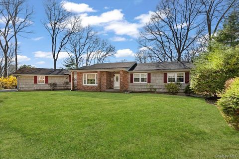 Photo of 22 Woodmont Road, Melville, NY 11747 (MLS # 985337)