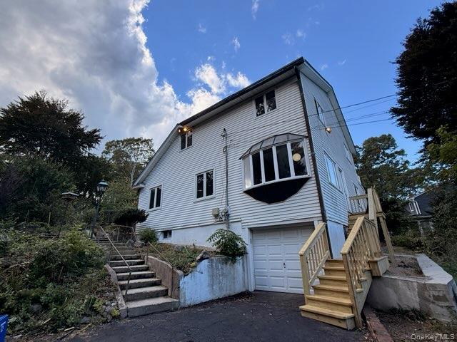 Photo of 54 Greenhills Road, Huntington Station, NY 11746 (MLS # 1058711)