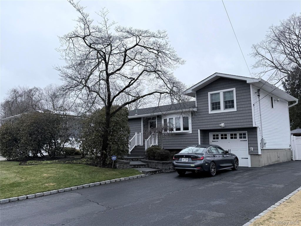 Photo of 11 Meehan Lane, Coram, NY 11727 (MLS # 966849)