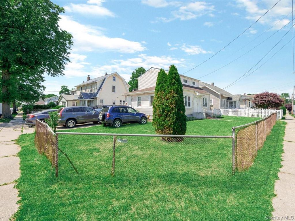 Photo of 72 Pleasant Avenue, Roosevelt, NY 11575 (MLS # 1007661)