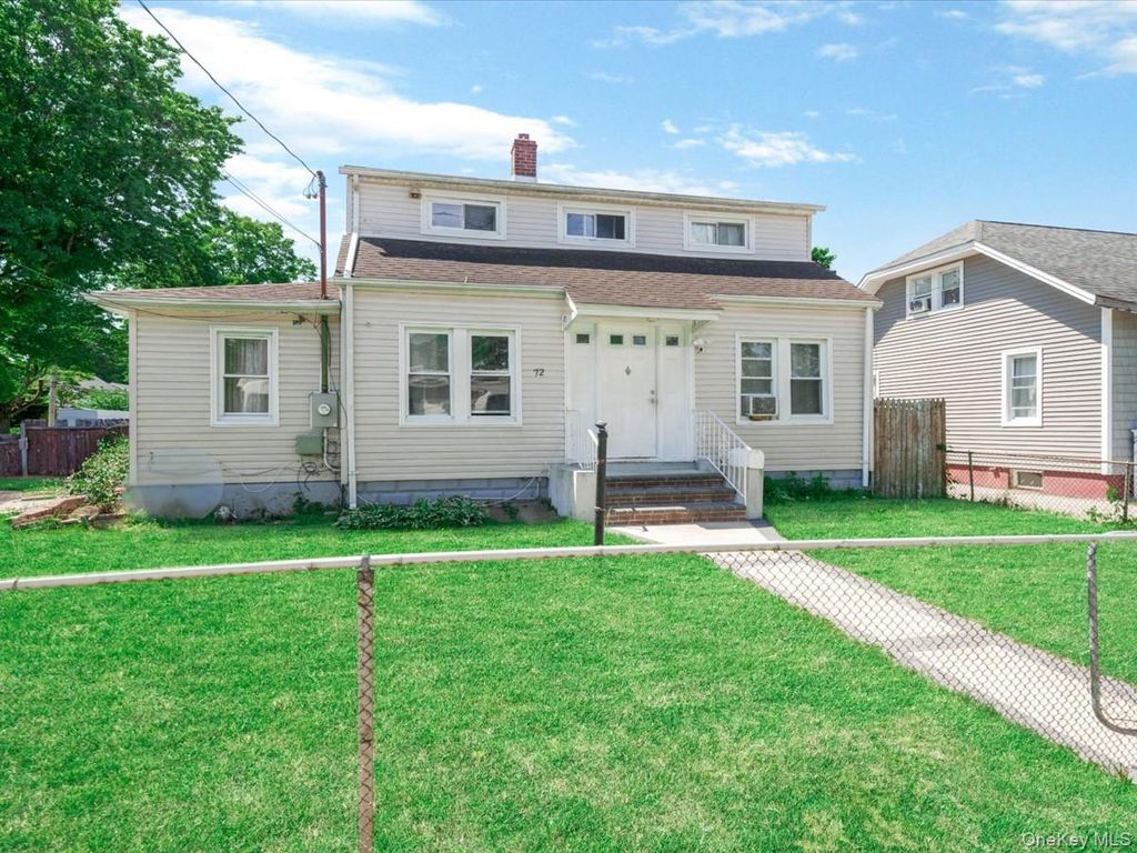 Photo of 72 Pleasant Avenue, Roosevelt, NY 11575 (MLS # 1007661)