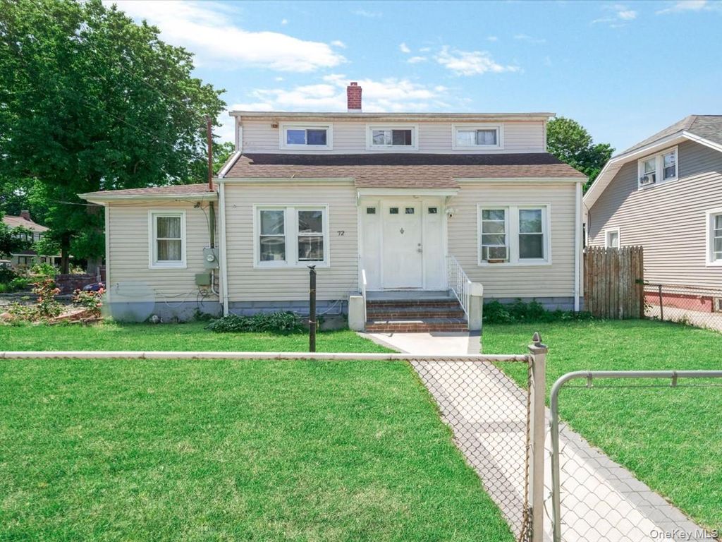 Photo of 72 Pleasant Avenue, Roosevelt, NY 11575 (MLS # 1007661)