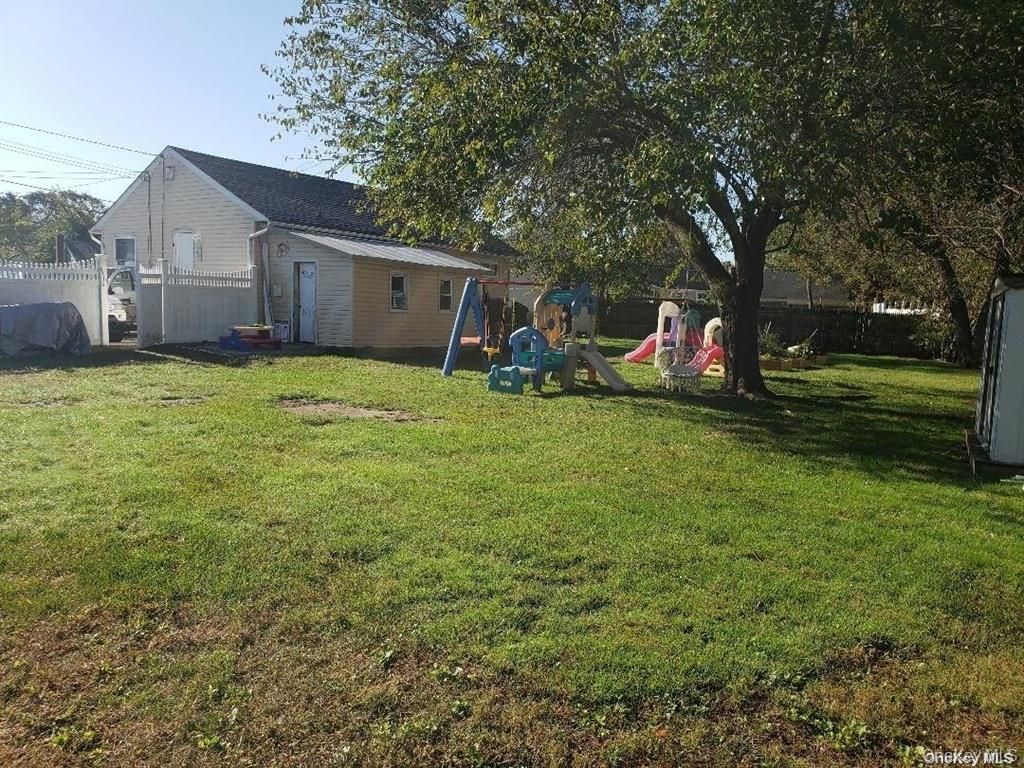 Photo of 56 Benjoe Drive, Amityville, NY 11701 (MLS # 991408)