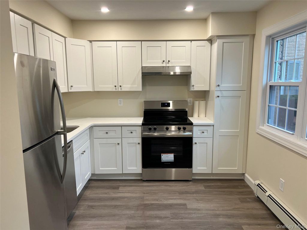 Photo of 43 Springwood Drive, North Babylon, NY 11703 (MLS # 944408)