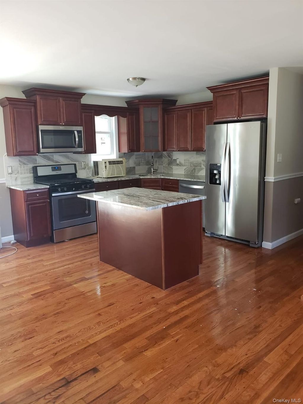 Photo of 167 Oakland Avenue, Central Islip, NY 11722 (MLS # 969747)