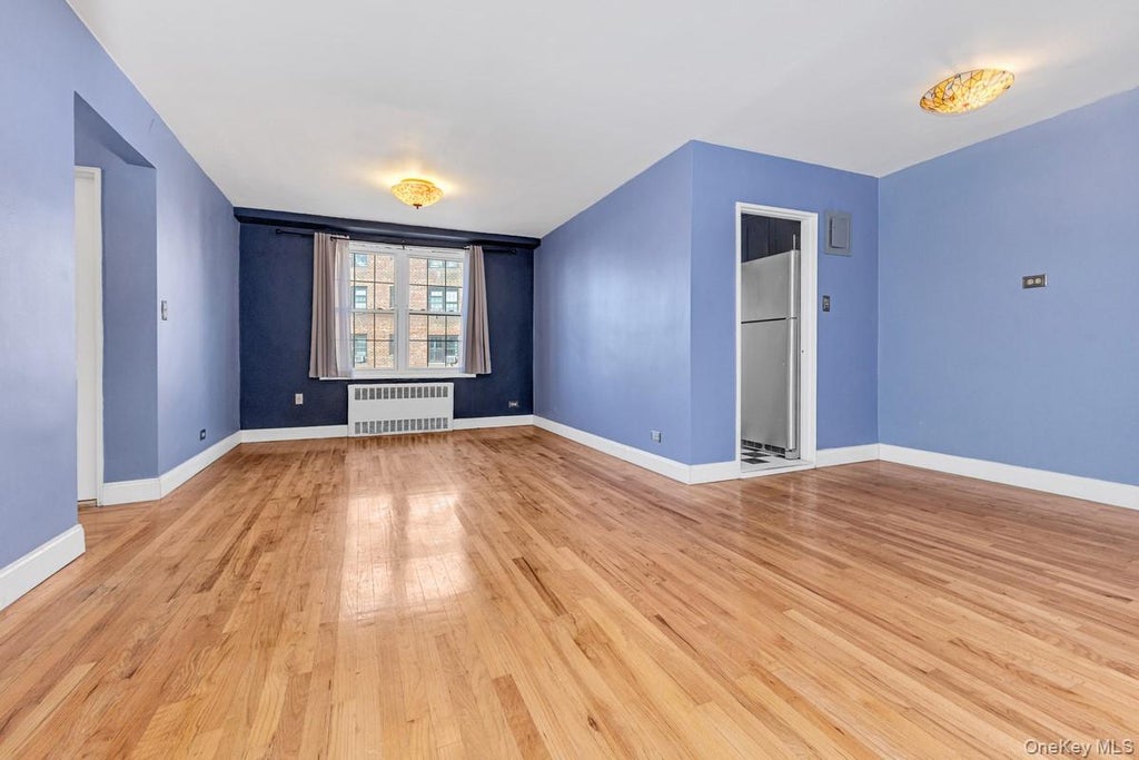 Photo of 140-21 Burden Crescent Cres #306, Briarwood, NY 11435 (MLS # 1060865)