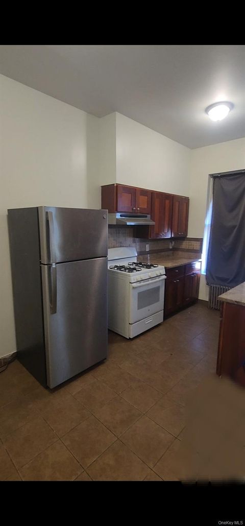Photo of 120-15 Jamaica Ave Ave #2, Richmond Hill, NY 11418 (MLS # 990077)