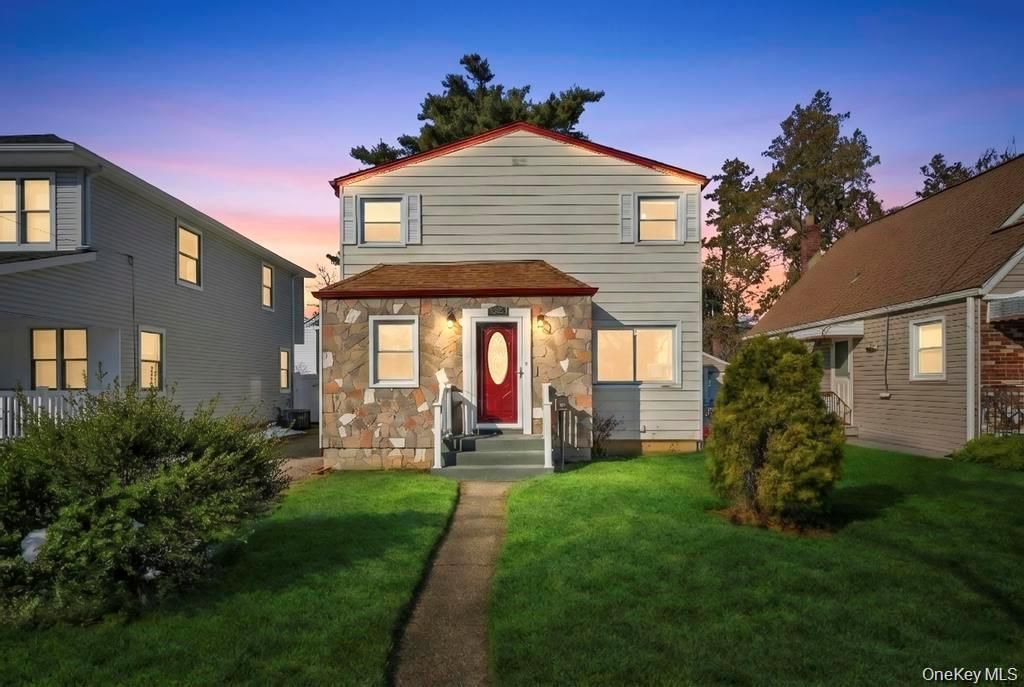 Photo of 627 10th Avenue, New Hyde Park, NY 11040 (MLS # 995825)