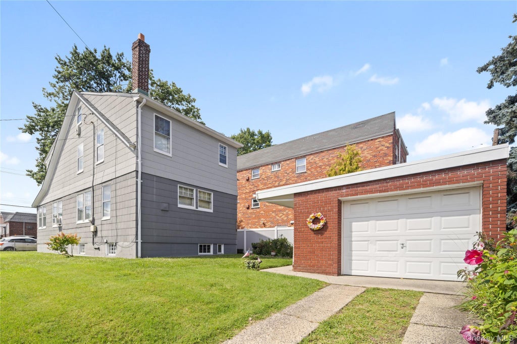 Photo of 6045 69th Street, Maspeth, NY 11378 (MLS # 1048614)