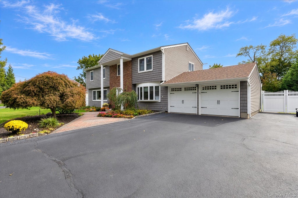 Photo of 24 Frank Street, Smithtown, NY 11787 (MLS # 1058590)