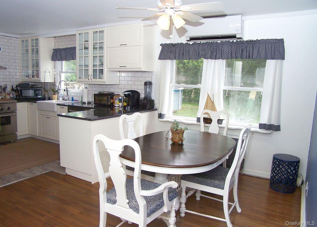 Photo of 10 Clarence Street, Copiague, NY 11726 (MLS # 945510)