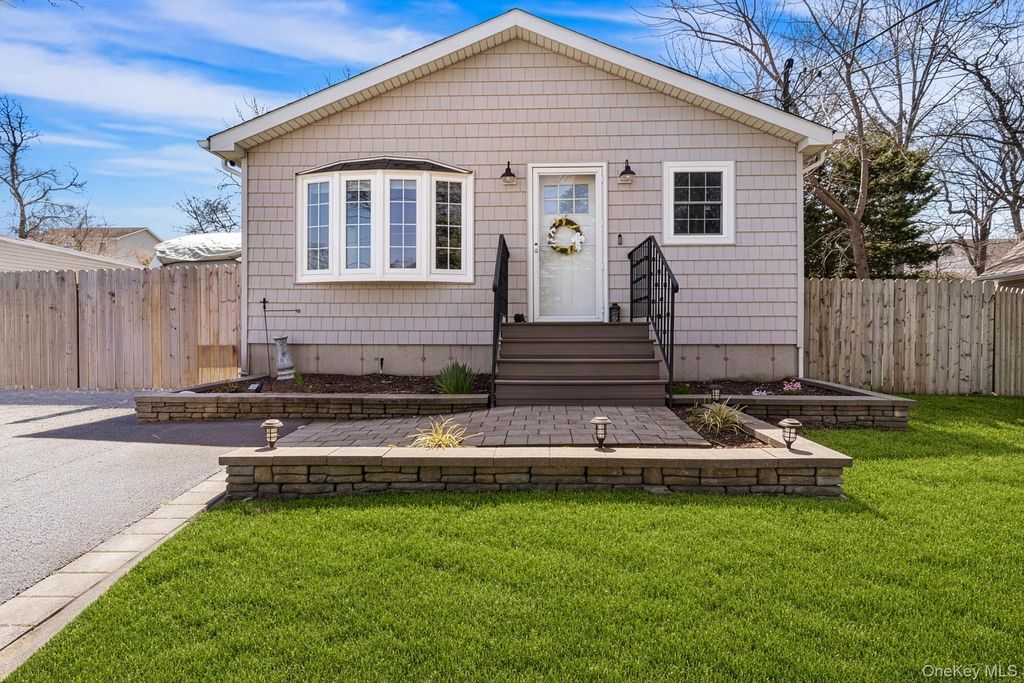 Photo of 22 Beech Avenue, Farmingville, NY 11738 (MLS # 984446)