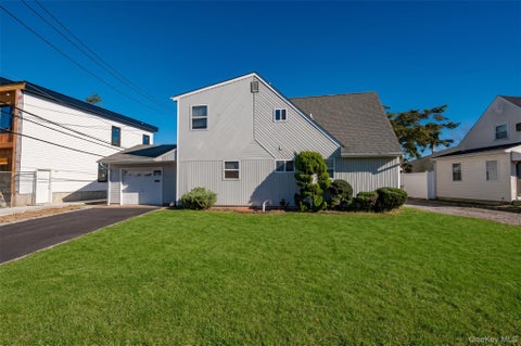 Photo of 148 Kingfisher Road, Levittown, NY 11756 (MLS # 1062658)