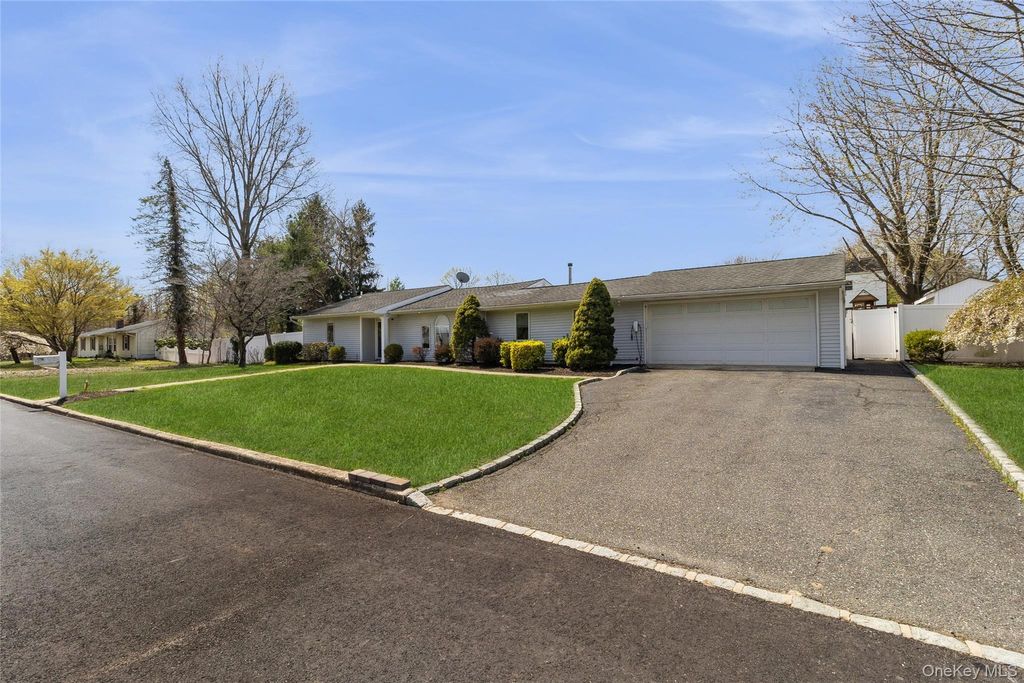 Photo of 22 Hawthorne Street, Mount Sinai, NY 11766 (MLS # 985917)