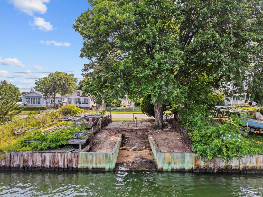 Photo of 81 Wilson Avenue, Amityville, NY 11701 (MLS # 1050666)