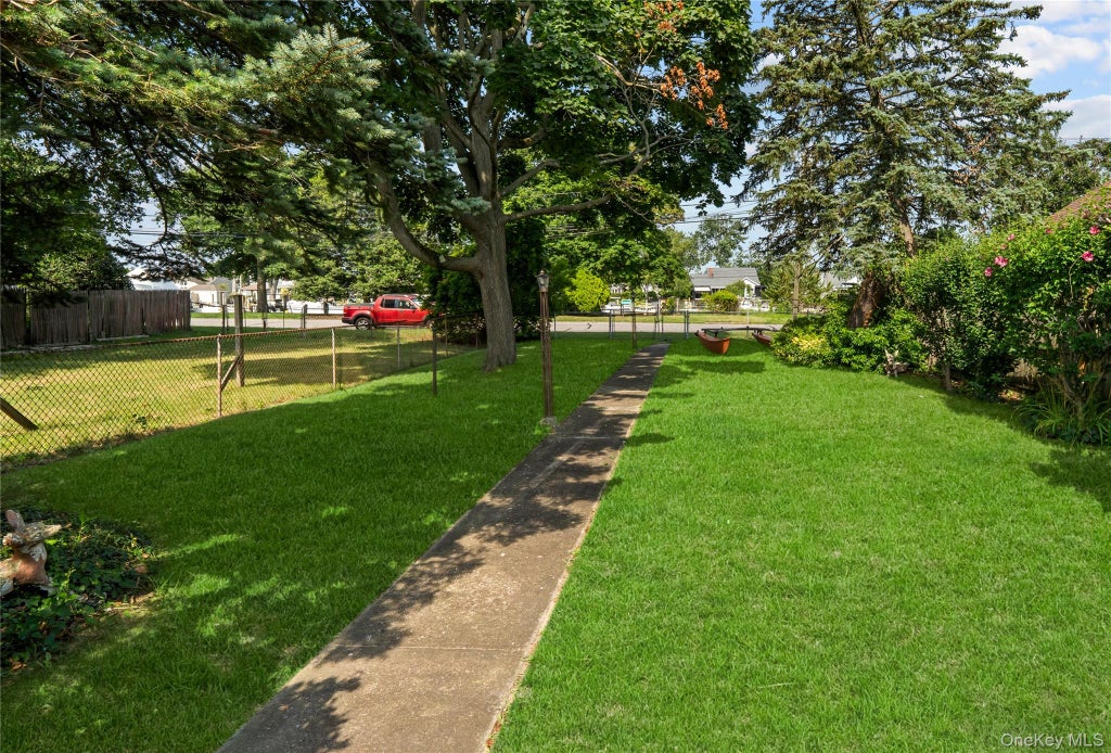 Photo of 81 Wilson Avenue, Amityville, NY 11701 (MLS # 1050666)