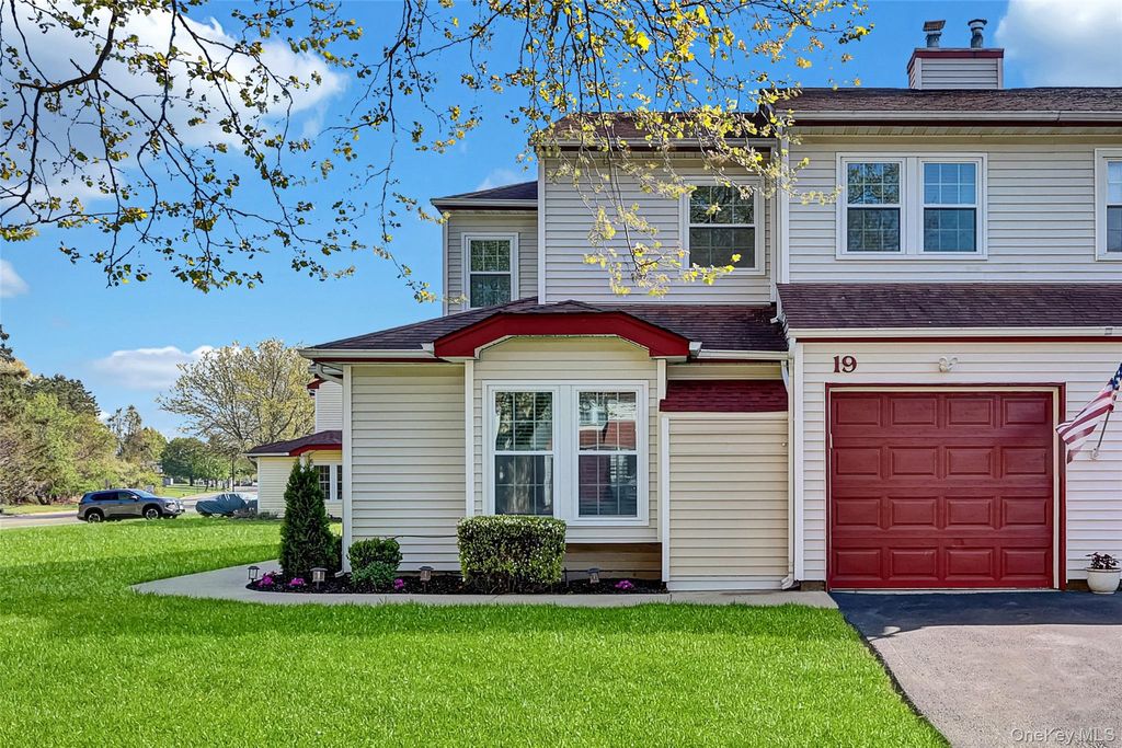 Photo of 19 Delaware Court, Coram, NY 11727 (MLS # 995764)