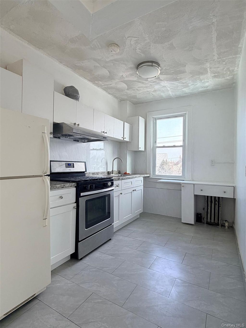 Photo of 4628 Utopia Parkway #2FL, Flushing, NY 11358 (MLS # 965776)