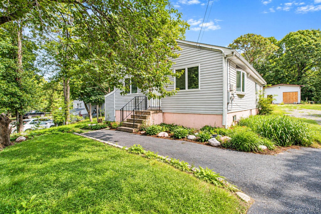 Photo of 95 W Bartlett Road, Middle Island, NY 11953 (MLS # 1056935)